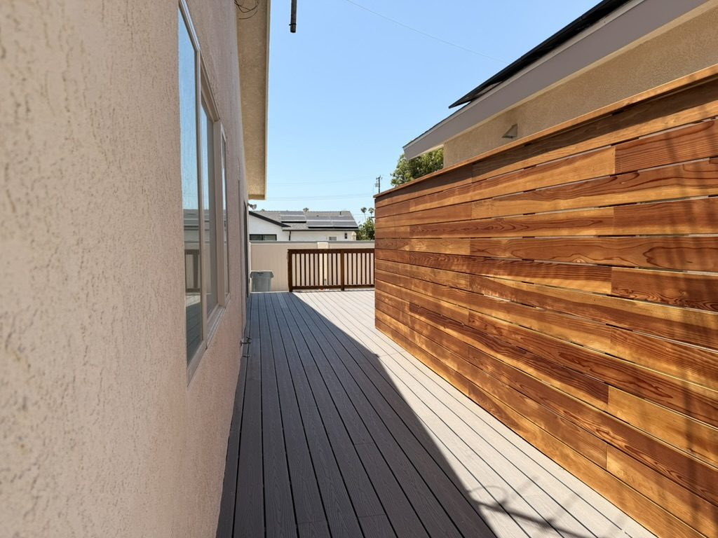 Redwood privacy screen and composite decking, built
