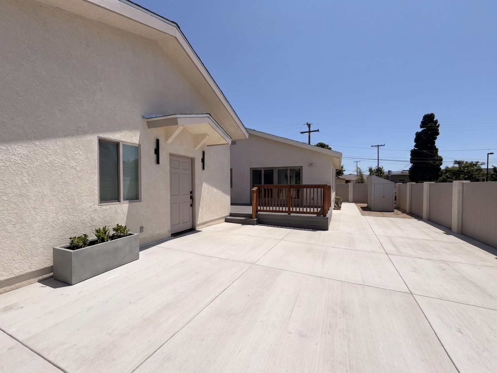 New concrete side yard beside the Bayersdorff ADU