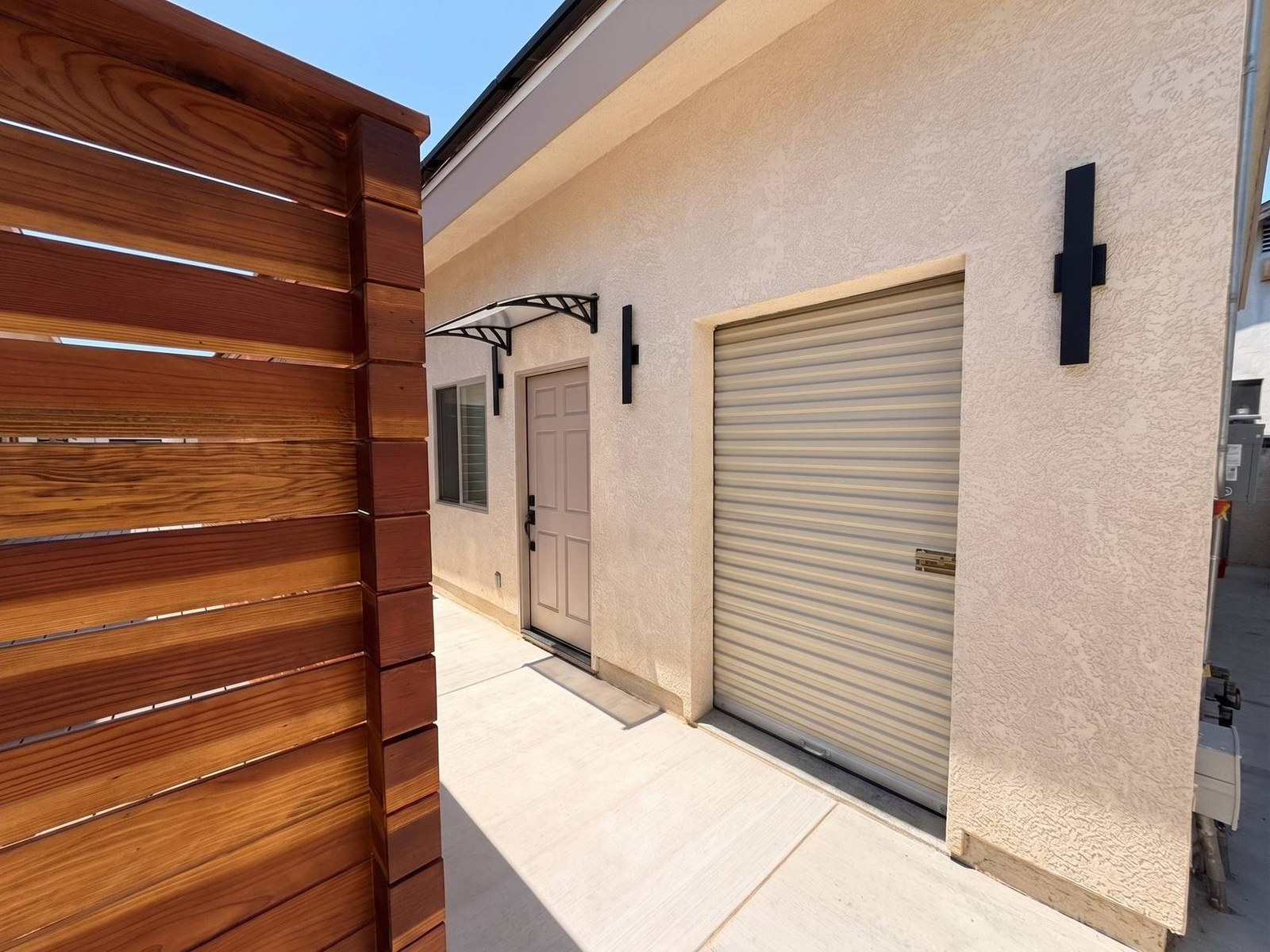 Redwood screen at the roll up door, Bayersdorff Residence