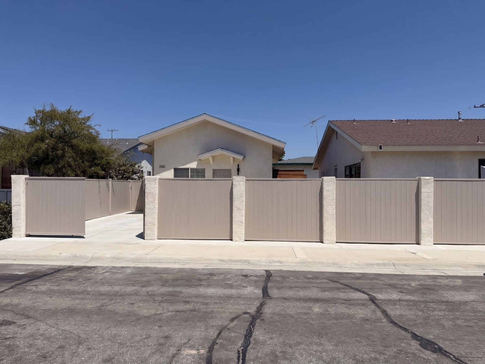New fence and flatwork from the street, Torrance
