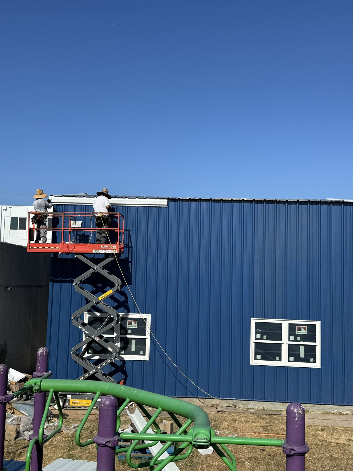 Steel building being skinned, Carson