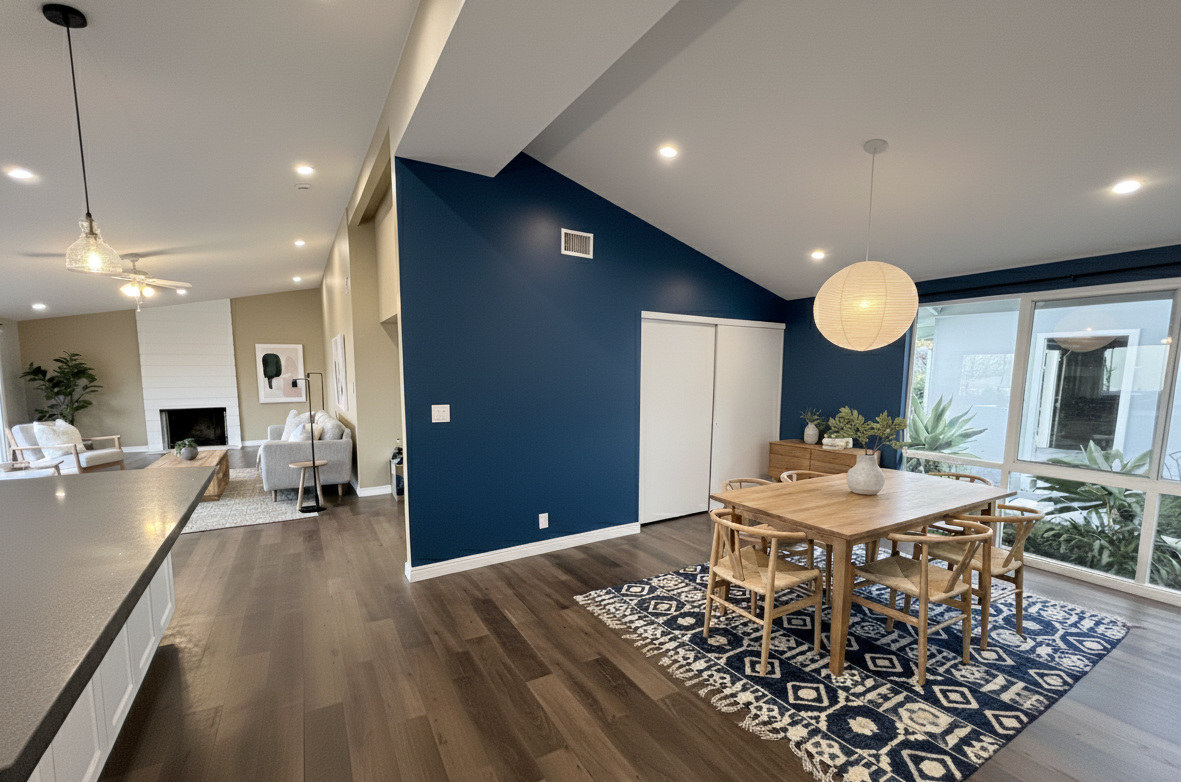 Dining room with navy accent wall and vaulted ceiling, Rolling Hills Estate remodel