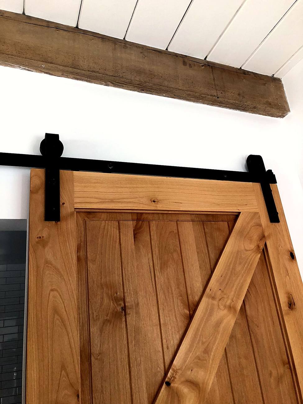 Custom barn door and exposed beam, Walnut Residence