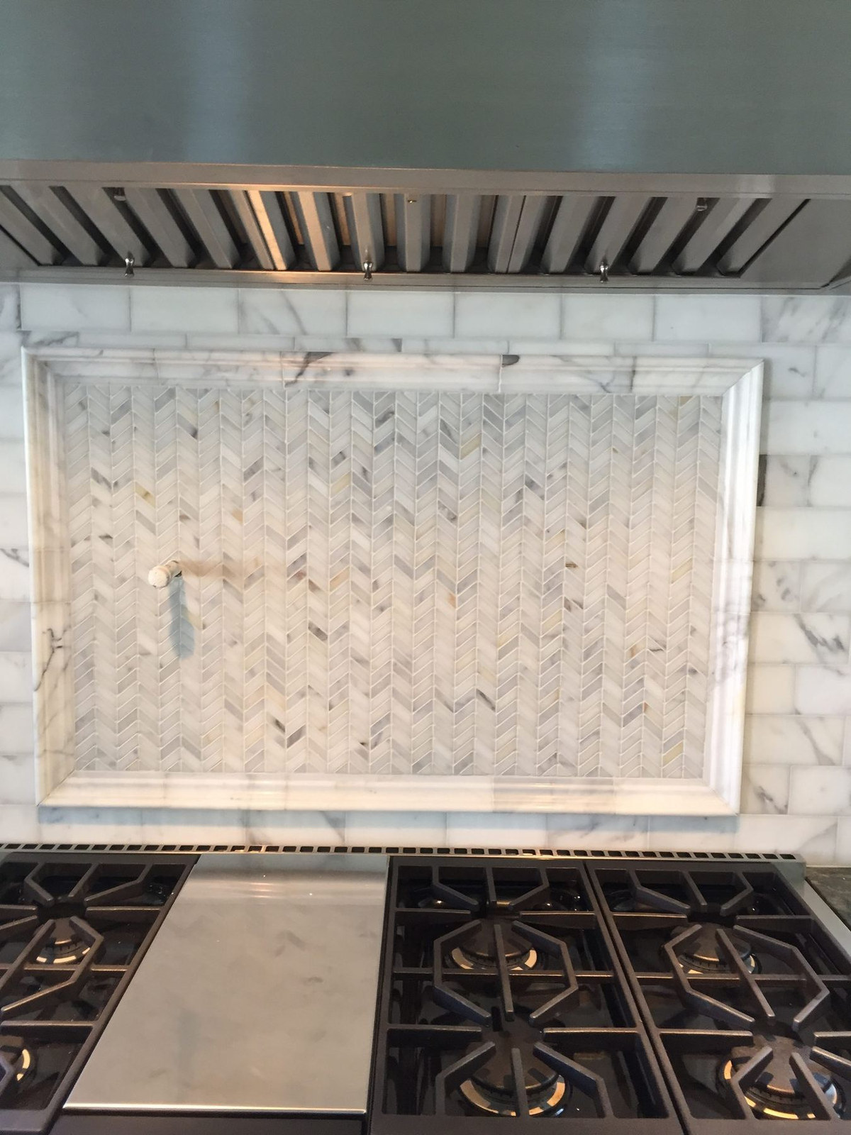 Marble backsplash being set, Ynes Residence
