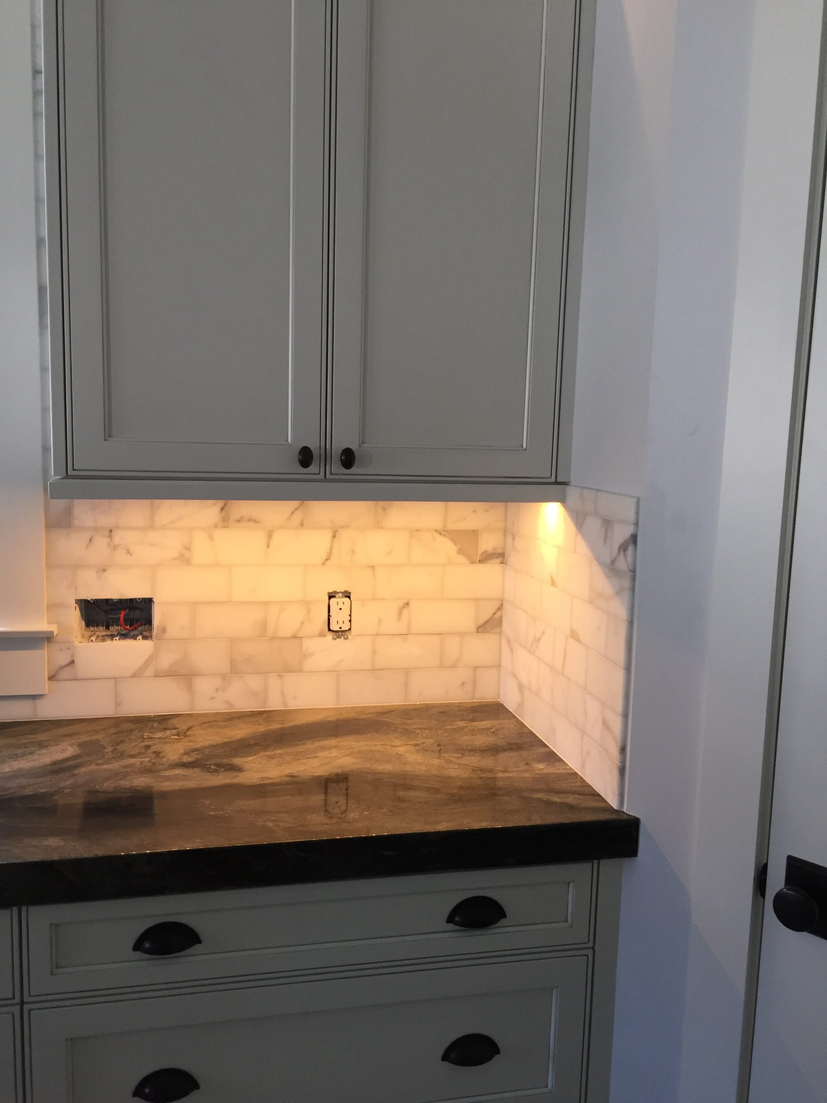 Marble backsplash and walnut counter, Ynes Residence